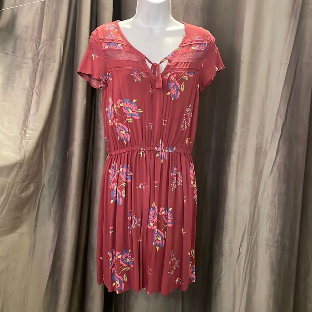 Women’s rose colored dress size medium.